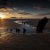 Buy canvas prints of  Rossili bay, Worm's head and the wreck of Helveti by Leighton Collins