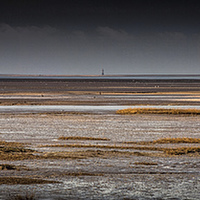 Buy canvas prints of  Whitford Burrows and lighthouse by Leighton Collins