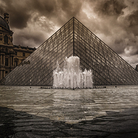 Buy canvas prints of  The Louvre Pyramid in Paris by Leighton Collins
