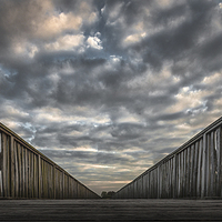 Buy canvas prints of A wooden bridge by Leighton Collins