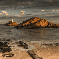Buy canvas prints of  Sunset on Mumbles lighthouse Swansea by Leighton Collins
