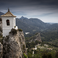 Buy canvas prints of  Guadalest bell tower by Leighton Collins