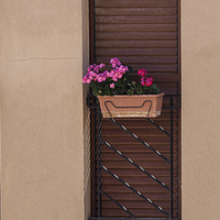 Buy canvas prints of  Spanish window boxes by Leighton Collins