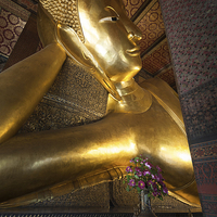 Buy canvas prints of  Reclining Buddha in Bangkok by Leighton Collins