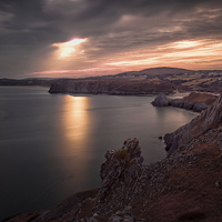 Buy canvas prints of  The Great Tor and Three Cliffs Bay by Leighton Collins