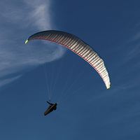 Buy canvas prints of  paraglider over Gower by Leighton Collins