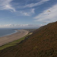 Buy canvas prints of  Paragliding at Rhossili by Leighton Collins