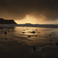 Buy canvas prints of  Storm clouds at Worms Head  by Leighton Collins