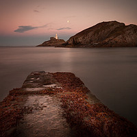 Buy canvas prints of Mumbles lighthouse at night by Leighton Collins