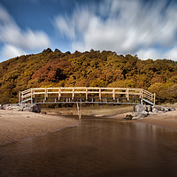 Buy canvas prints of Oxwich Bay river footbridge by Leighton Collins