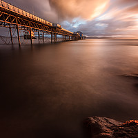 Buy canvas prints of Mumbles pier sunrise by Leighton Collins