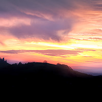 Buy canvas prints of Dramatic sunset at Carreg Cennen Castle  by Leighton Collins