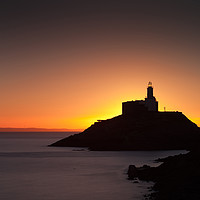Buy canvas prints of Golden sunrise over Mumbles lighthouse by Leighton Collins