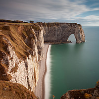 Buy canvas prints of The cliffs and Manneporte arch at Etretat by Leighton Collins