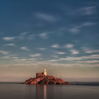 Buy canvas prints of Calm sea at Mumbles lighthouse by Leighton Collins