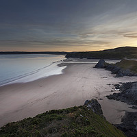 Buy canvas prints of Three Cliffs Bay and The Great Tor by Leighton Collins