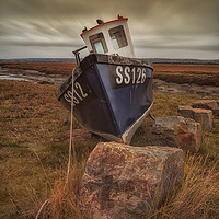 Buy canvas prints of Estuary fishing boat by Leighton Collins