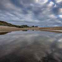 Buy canvas prints of Reflections at Three Cliffs Bay by Leighton Collins