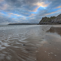 Buy canvas prints of Incoming tide at The Great Tor by Leighton Collins