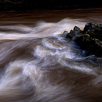 Buy canvas prints of The Afon Pyrddin in full flow by Leighton Collins