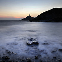 Buy canvas prints of Mumbles lighthouse in silhouette by Leighton Collins