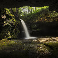 Buy canvas prints of A cave with a waterfall by Leighton Collins