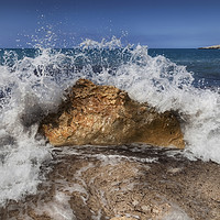 Buy canvas prints of Crashing wave on a Greek beach by Leighton Collins