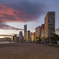 Buy canvas prints of Sunset at Levante beach in Benidorm by Leighton Collins