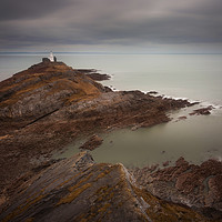 Buy canvas prints of Calm seas at Mumbles lighthouse by Leighton Collins