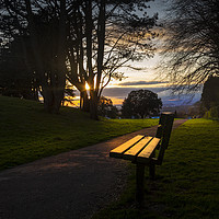 Buy canvas prints of Sunset and a park bench by Leighton Collins