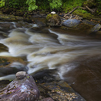 Buy canvas prints of Long exposure on the Twrch river by Leighton Collins