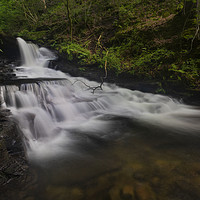 Buy canvas prints of The waterfall at Melincourt Brook by Leighton Collins