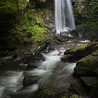 Buy canvas prints of Moody Melincourt waterfall in South Wales by Leighton Collins