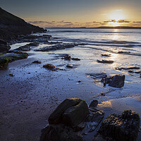Buy canvas prints of Sunset on Manorbier beach by Leighton Collins