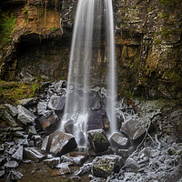 Buy canvas prints of Winter at Melincourt waterfall by Leighton Collins