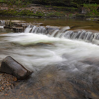 Buy canvas prints of The weir on the Upper Clydach River by Leighton Collins