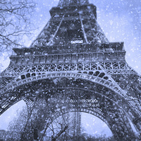 Buy canvas prints of Winter Wonderland at the Eiffel Tower by Les McLuckie