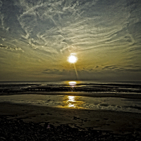 Buy canvas prints of Wispy clouds in the Sunset by Pete Moyes