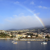 Buy canvas prints of The port of Funchal with a rainbow visible by Frank Irwin