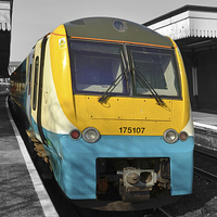 Buy canvas prints of An Arriva train leaving Colwyn bay station. by Frank Irwin