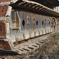 Buy canvas prints of Caterpillar Tracks on a vehicle by Frank Irwin