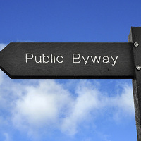 Buy canvas prints of Public Byway sign set against a blue sky. by Frank Irwin