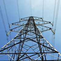 Buy canvas prints of A super pylon, from below against a blue sky by Frank Irwin