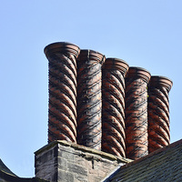 Buy canvas prints of An elaborate chimney seen at Port Sunlight Village by Frank Irwin
