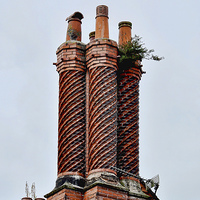 Buy canvas prints of An elaborate chimney seen at Port Sunlight Village by Frank Irwin