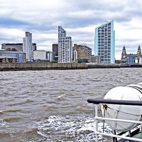 Buy canvas prints of Liverpools northern Waterfront viewed from a Ferry by Frank Irwin