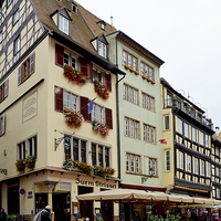 Buy canvas prints of Strasbourg houses with café bars on ground floor. by Frank Irwin