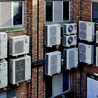 Buy canvas prints of A plethora of condenser units. by Frank Irwin