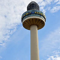 Buy canvas prints of Radio City Tower against a blue sky by Frank Irwin