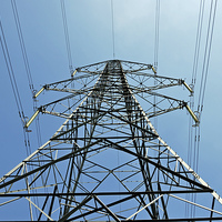 Buy canvas prints of A mighty Pylon against a blue sky by Frank Irwin